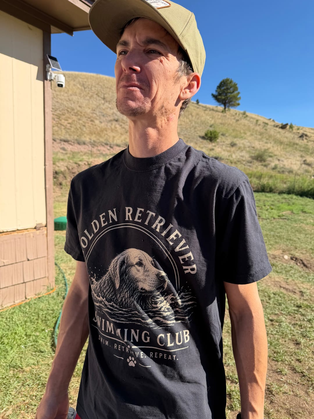 Customer photo review of Golden Retriever Swimming Club Premium Tee