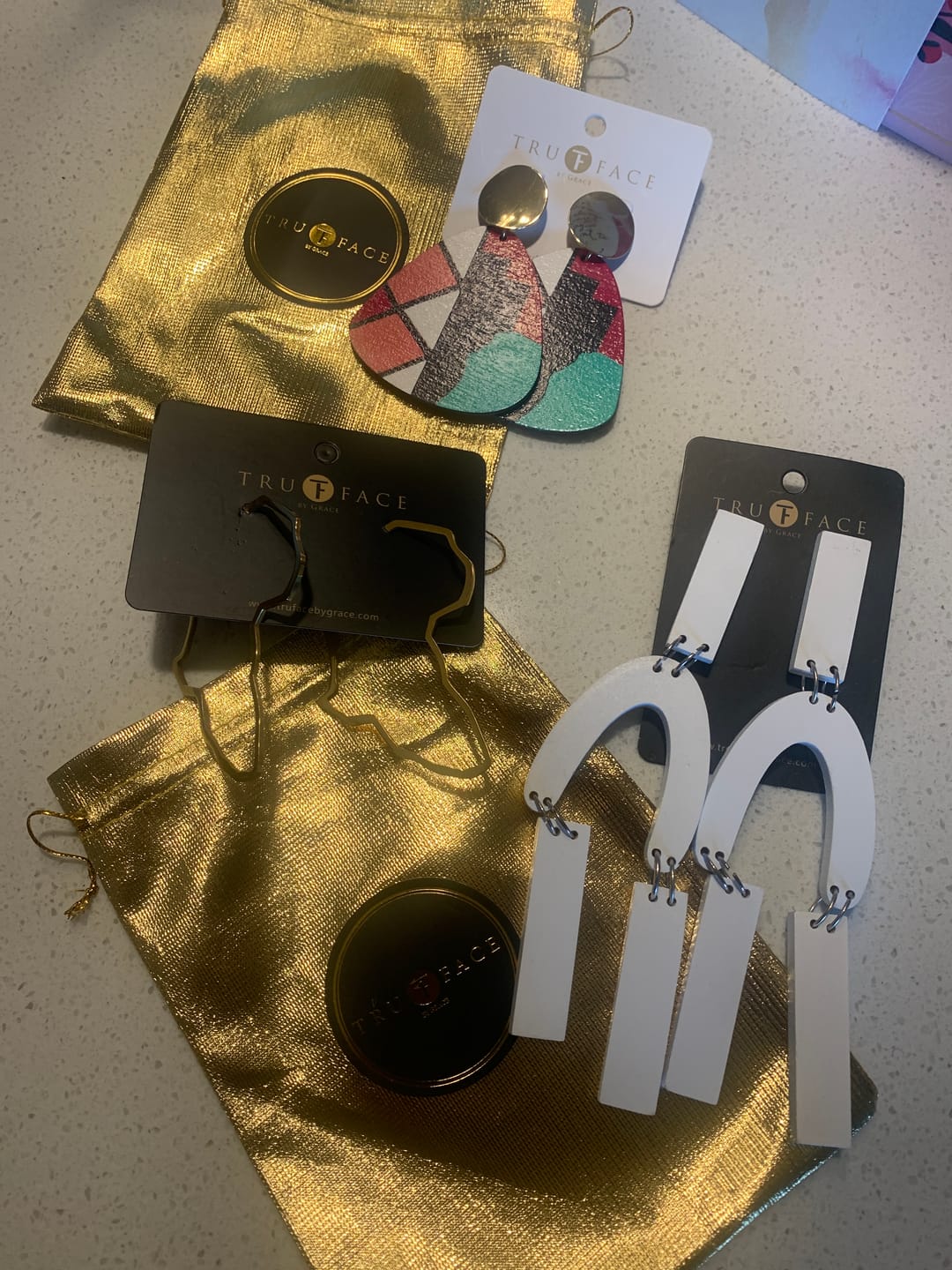 Customer photo review of Motherland Hoop Earrings