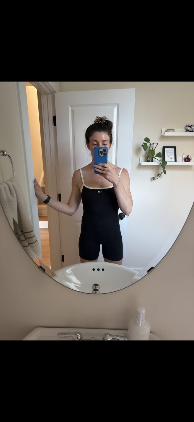 Customer photo review of The Shorts Onesie Black & Cream