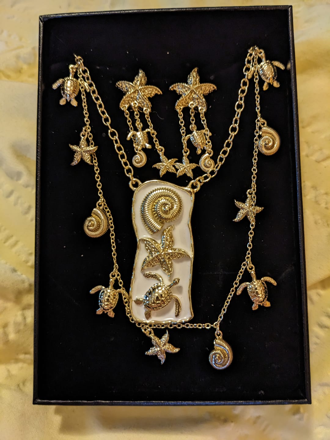 Customer photo review of Heidi Daus ® "Ocean Charm" Sea Life Dangle Earrings