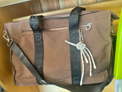 Reseña con foto de un cliente sobre Cartera Nylon Llavero