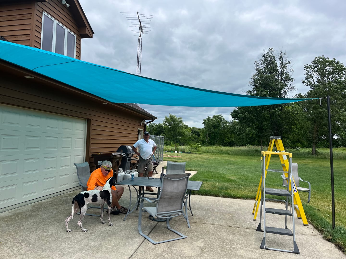 Customer photo review of Custom Sized Breathable UV Block Triangle HDPE Sun Shade Sail for Patio/Pool