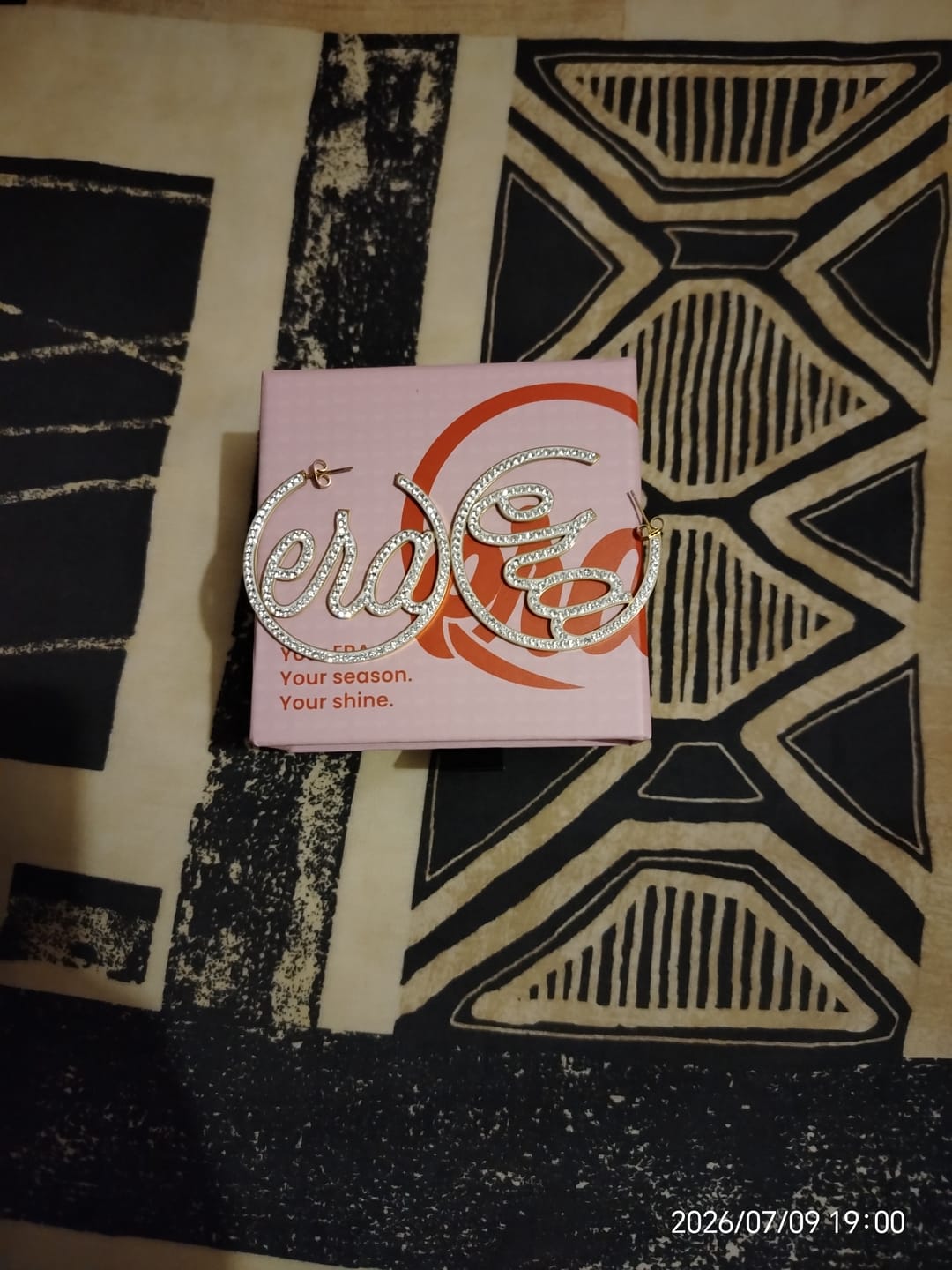 Customer photo review of Gold Luxe Logo Hoops
