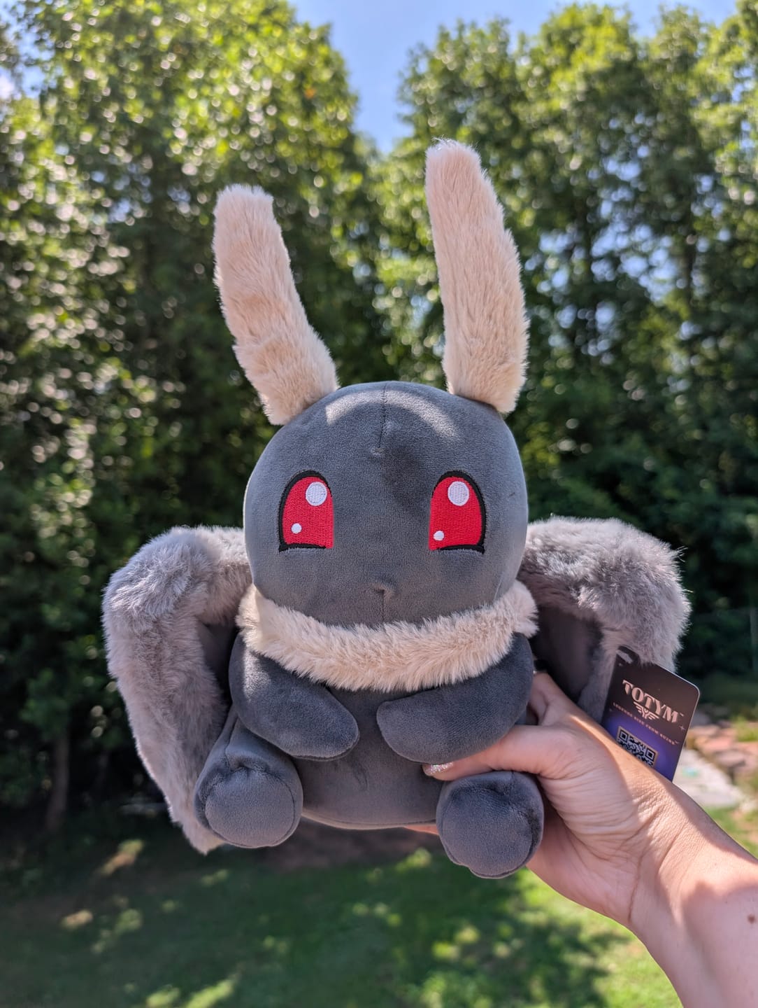Customer photo review of Motthew | Mothman Plush 🦋