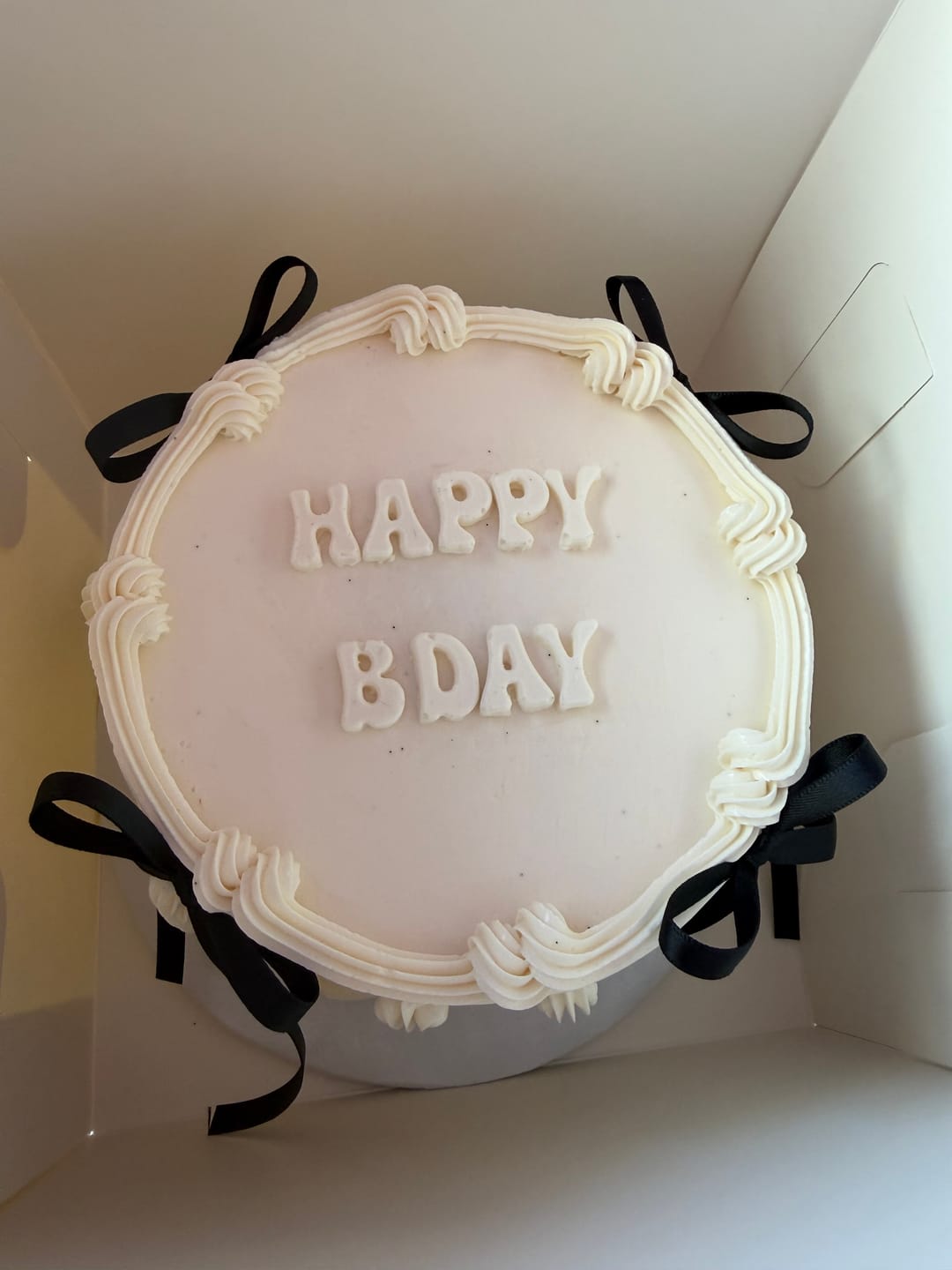 Customer photo review of Coquette Cake