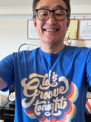 Customer's Let's Groove Tonight T-Shirt in blue, featuring a graphic design on the front.