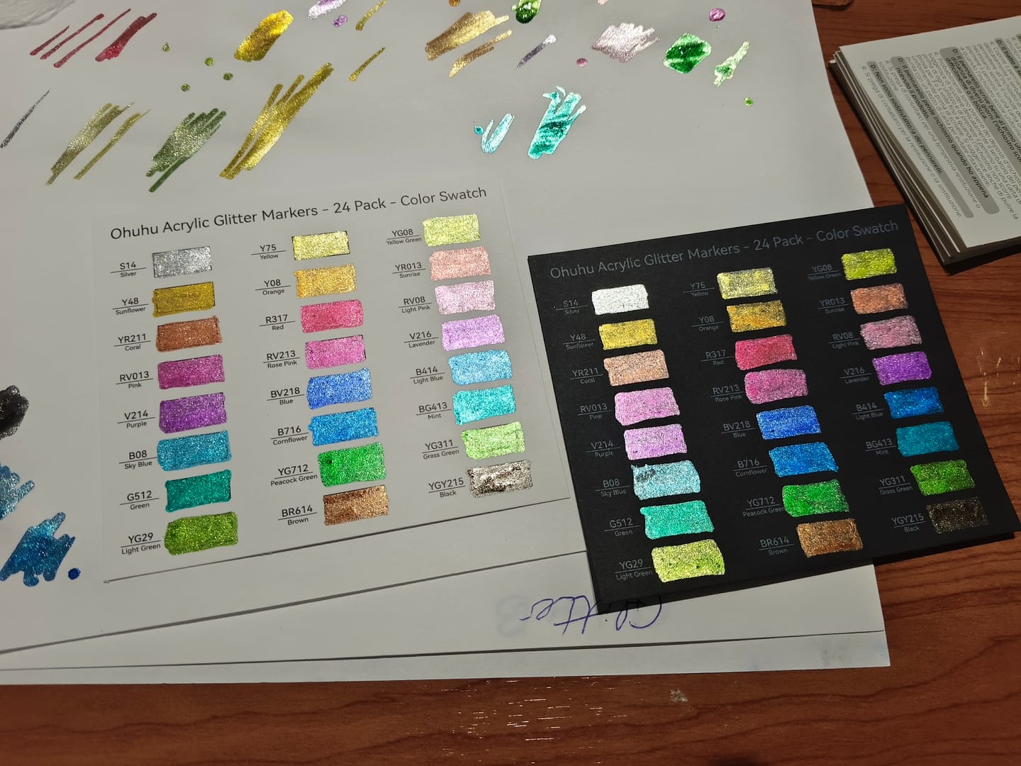 Customer photo review of Ohuhu Acrylic Metallic Glitter Markers, 24 Colors - 0.7mm & 3mm Tip Paint Pens