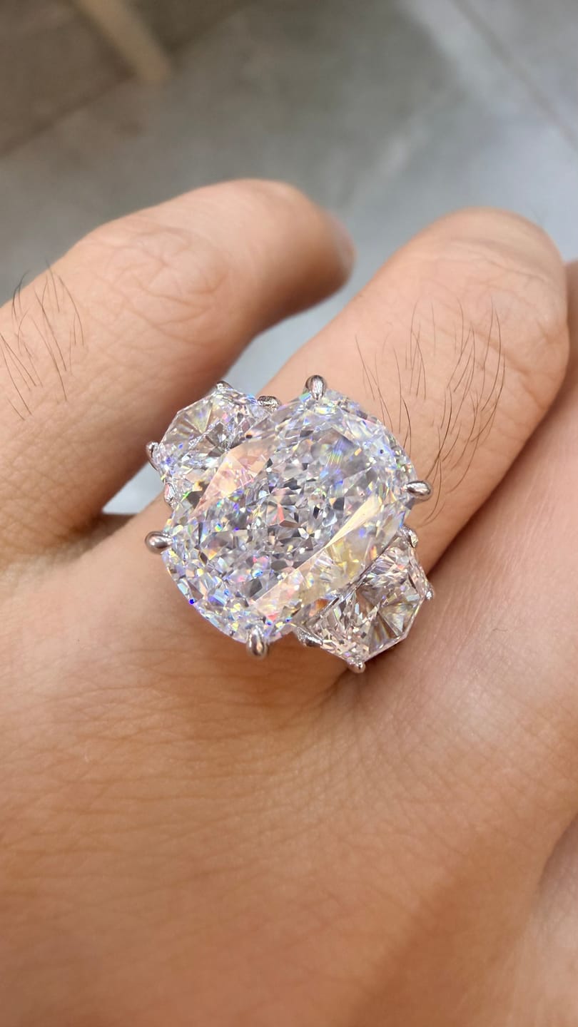 Customer photo review of 6.0 Ct Elongated Cushion Cut Simulated Diamond Three-Stone Travel Engagement Ring in S925 Sterling Silver