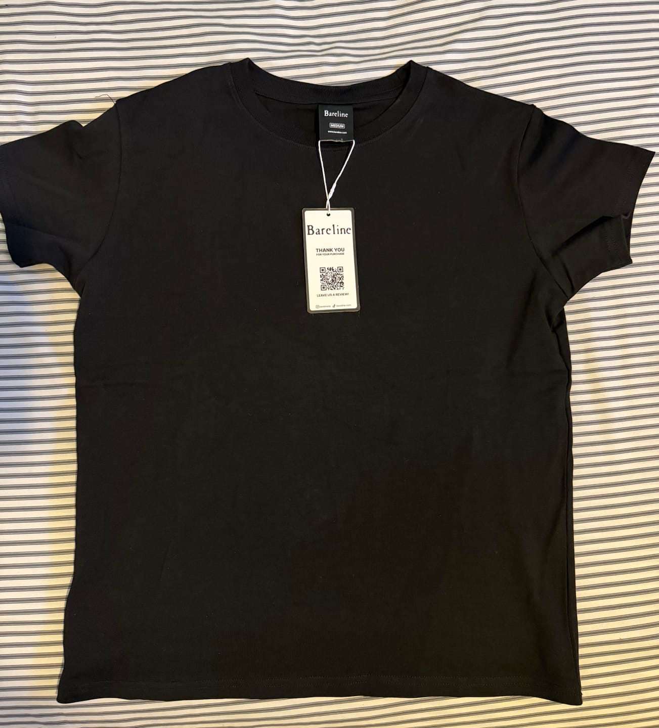 Customer photo review of Black Baby Tee | Mens
