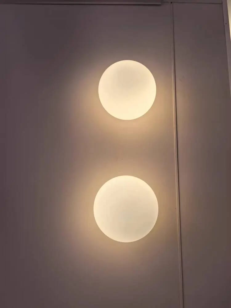 Customer photo review of Round Frosted Glass Wall Light, Single-LED Globe Fixture, Metal Base