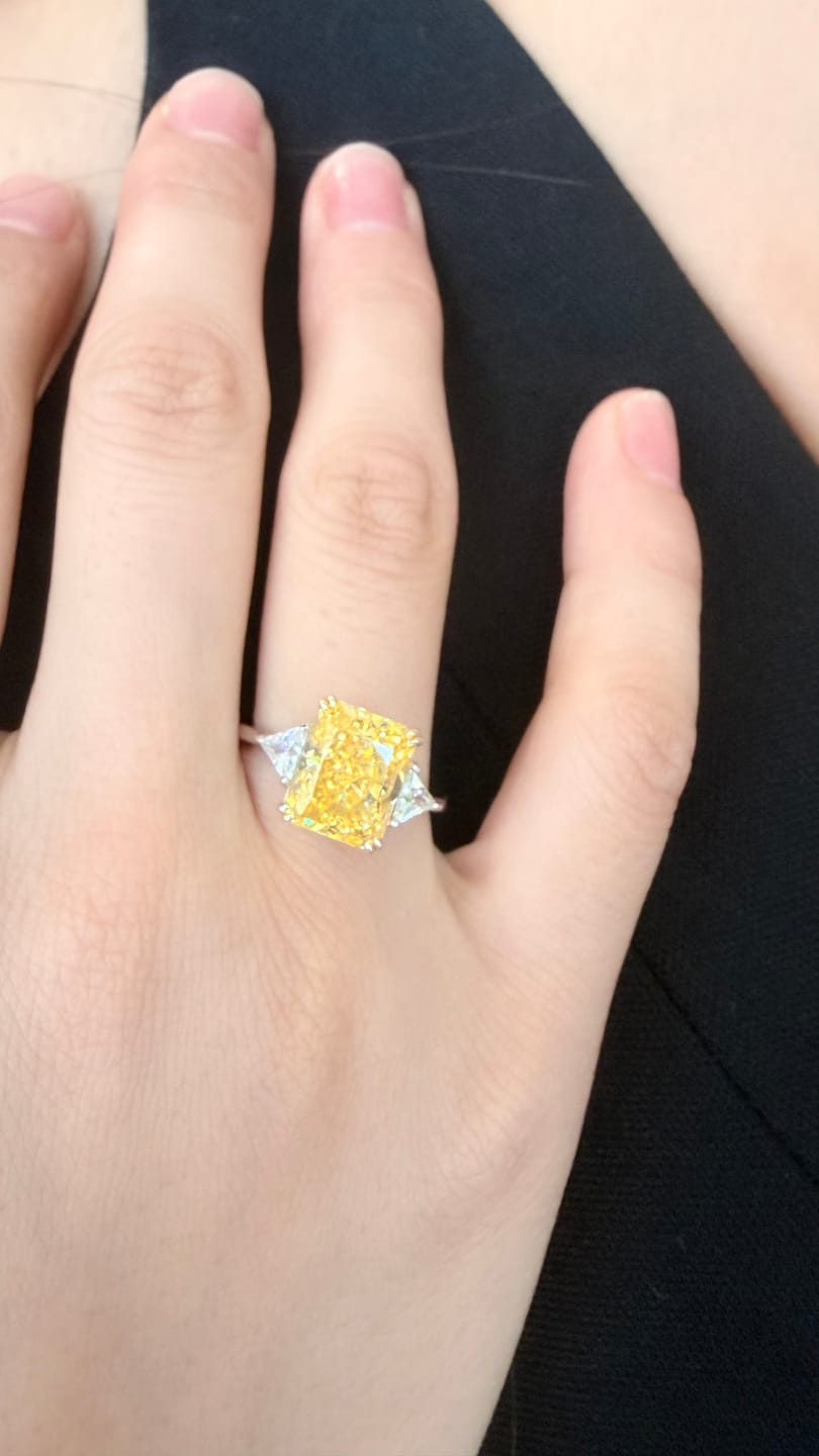 Customer photo review of S925 4.0Ct Radiant & Triangle Cut Yellow Stone Three Stone Engagement Ring In Sterling Silver