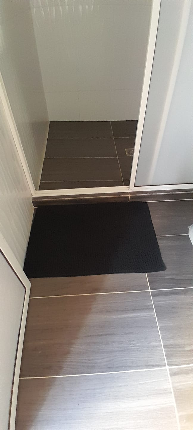 Customer photo review of Tapete Absorbente Salida de Baño