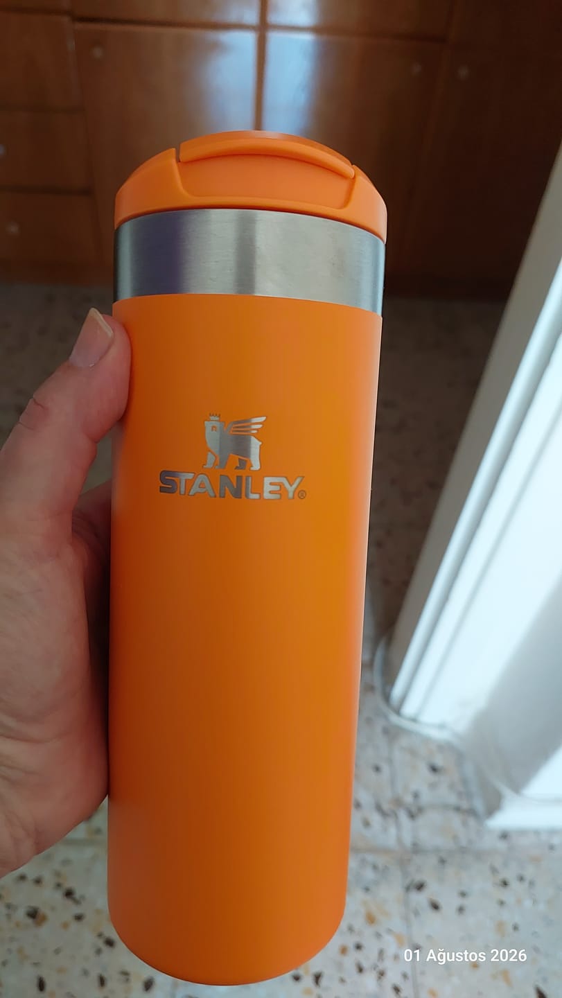Customer photo review of Stanley The Aerolight Transit Mug Goldenrod Coral 0.47L