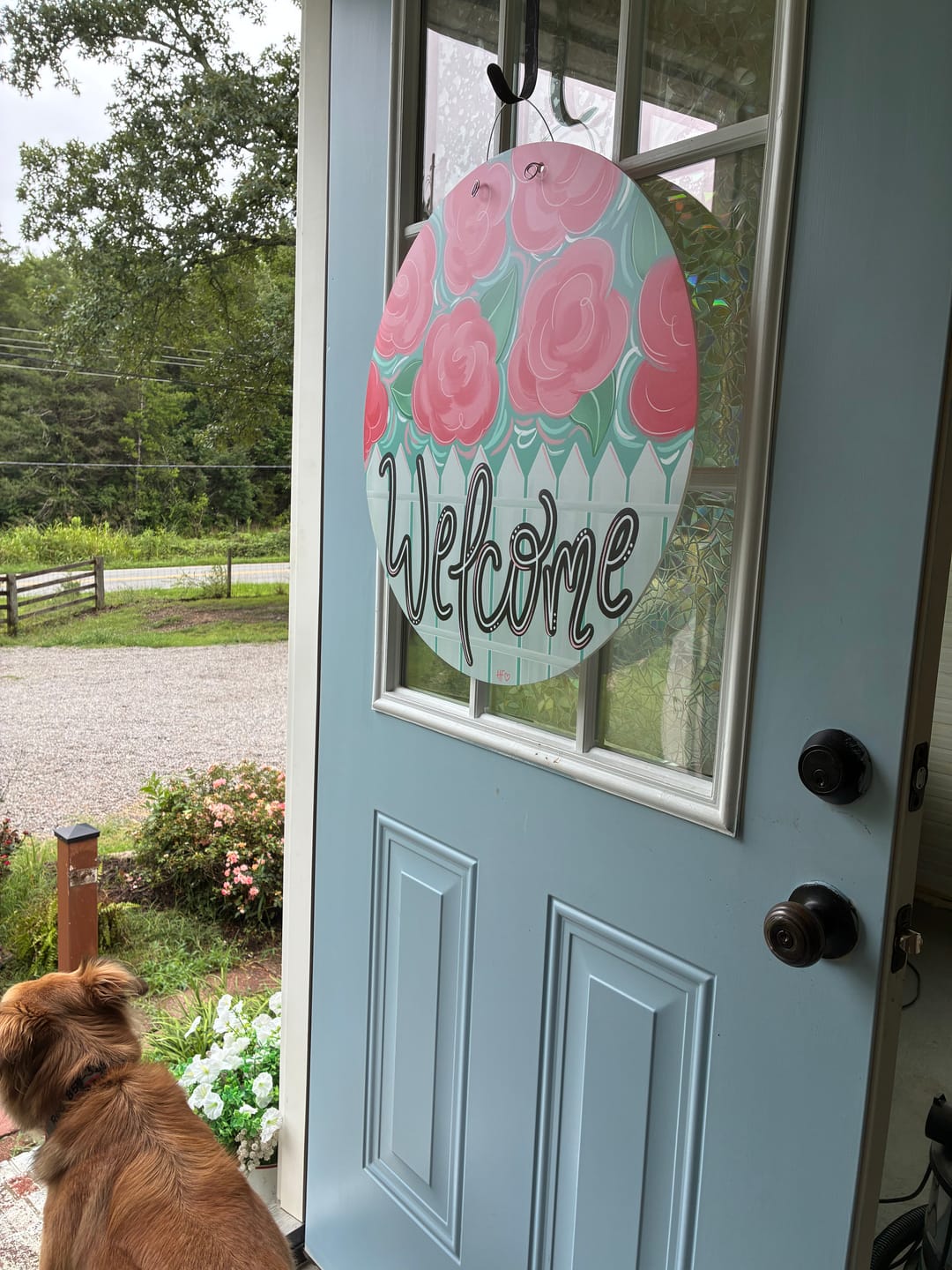 Customer photo review of Pink Flower Fence Welcome Door Hanger