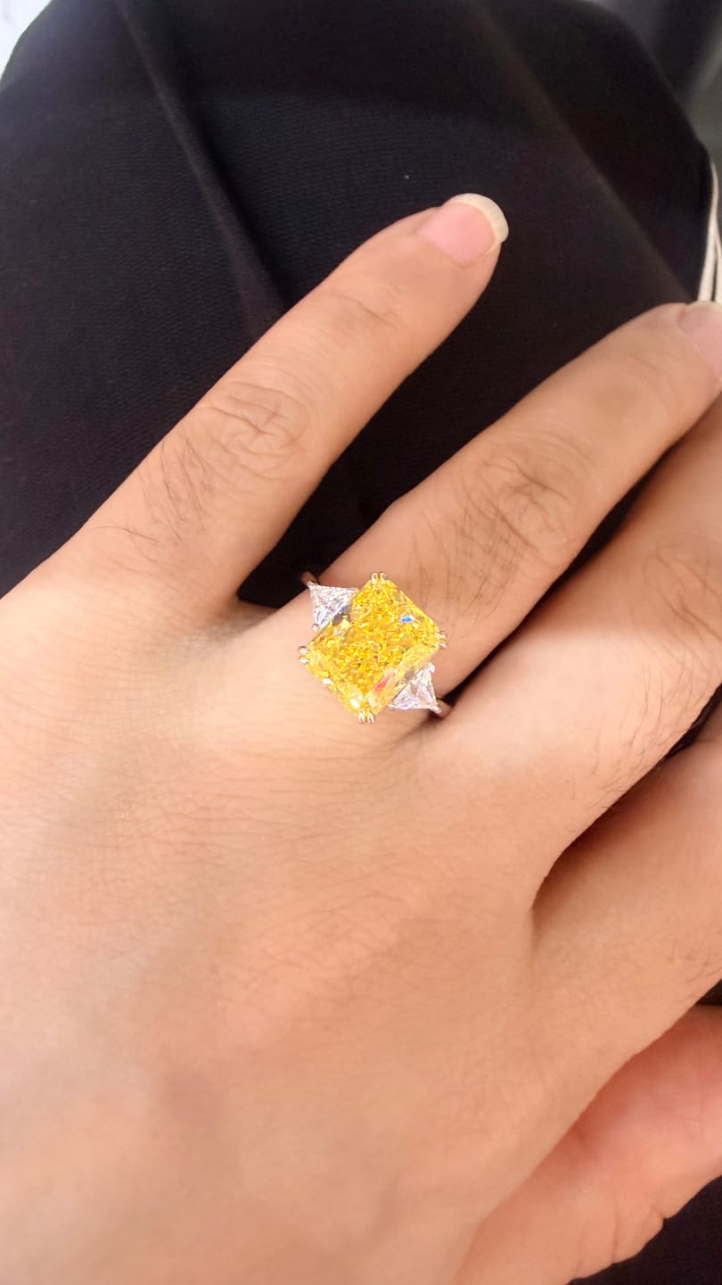 Customer photo review of S925 4.0Ct Radiant & Triangle Cut Yellow Stone Three Stone Engagement Ring In Sterling Silver
