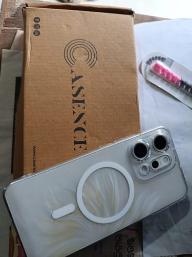 Customer's Anti Yellow Magsafe Clear Case for OPPO RENNO 14 PRO, shown beside its shipping box and accessories.