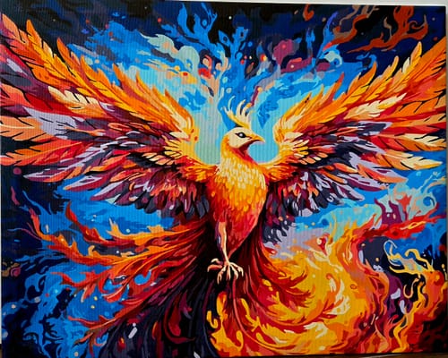 Customer's Custom Paint by Numbers Kit showing a completed, vibrant painting of a phoenix rising against blue flames.