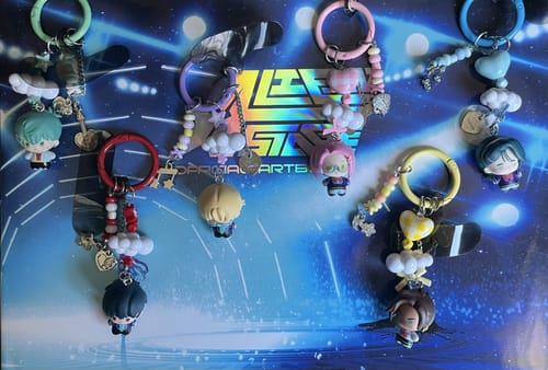 Customer's collection of six Alien Stage Rice Grain Chain blind box keychains, featuring colorful characters.