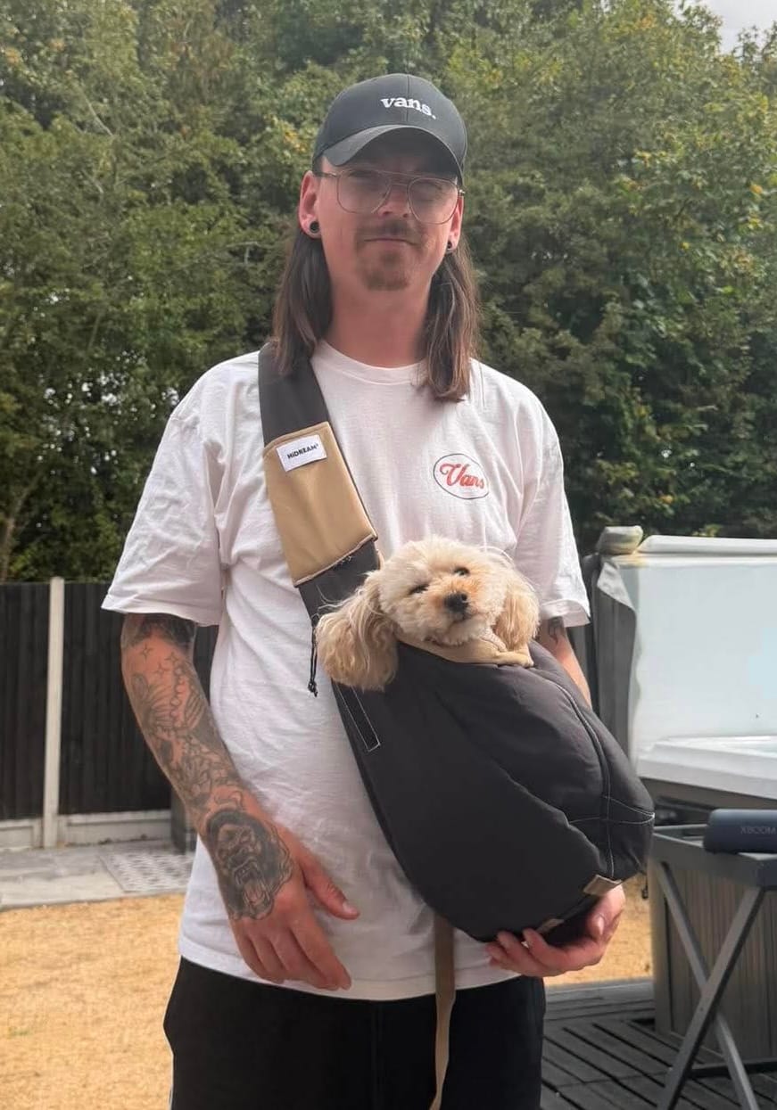 Customer photo review of Ergonomic Portable Hands-Free Pet Sling Carrier