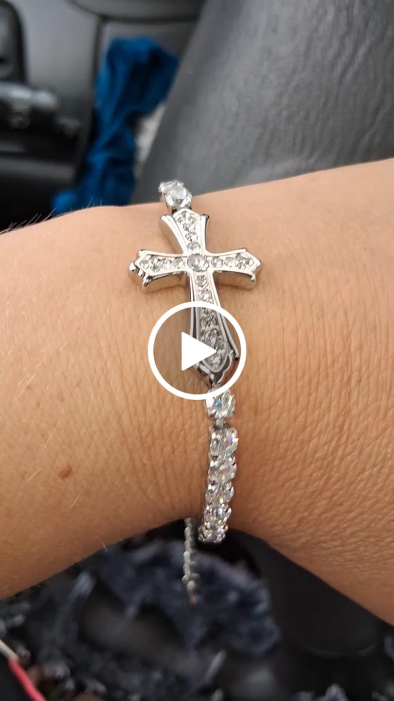 Customer video review of FREE Today: 2-Color Elegant Zircon-Encrusted Cross Bracelet: A Symbol of Divine Grace & Elegance