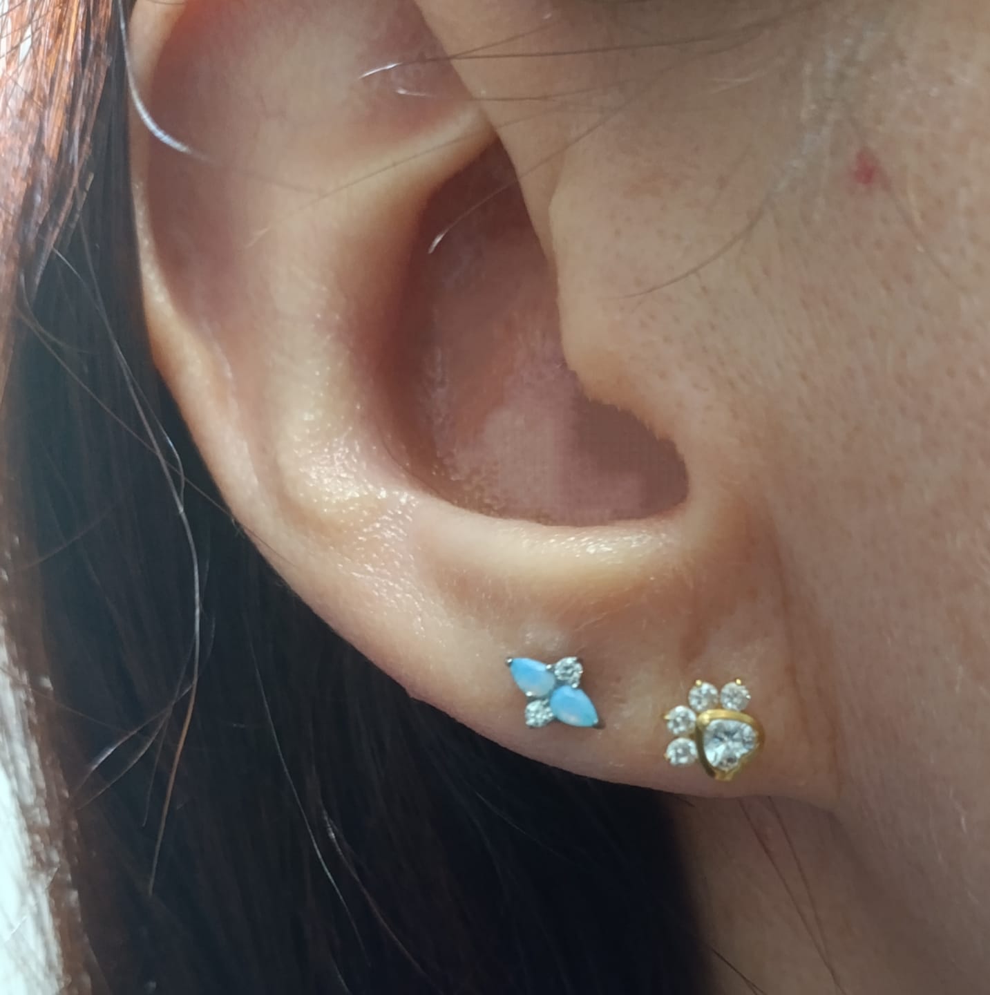 Customer photo review of Piercing Opal Sky 1era Perforación Titanio