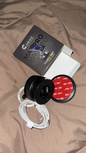 Customer's unboxed Casence MagPro Magnetic Phone Holder with its retail packaging, a mounting base, and white cable.