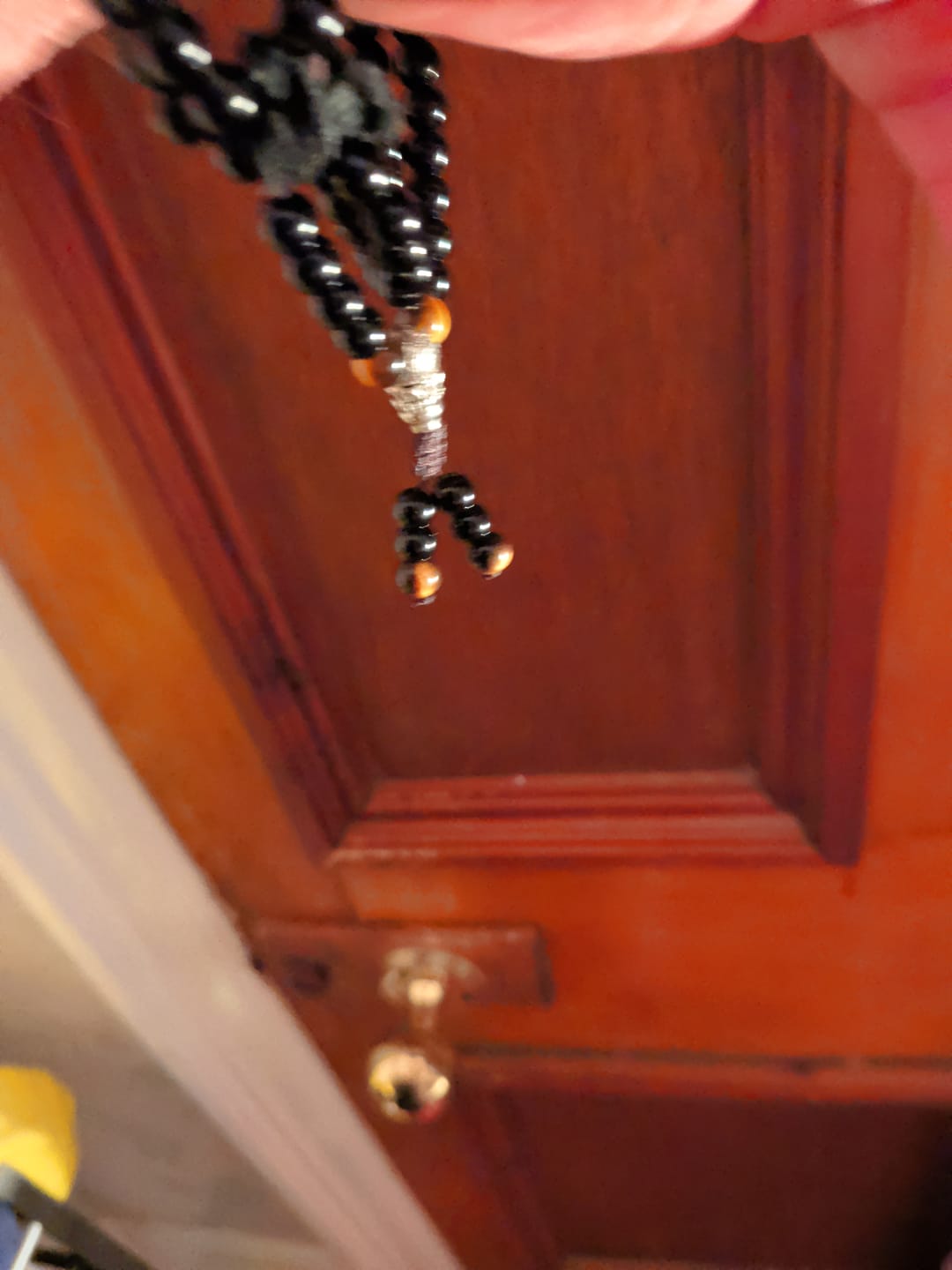 Customer photo review of Buddha Stones Black Obsidian Tiger Eye Blessing Mala Bracelet