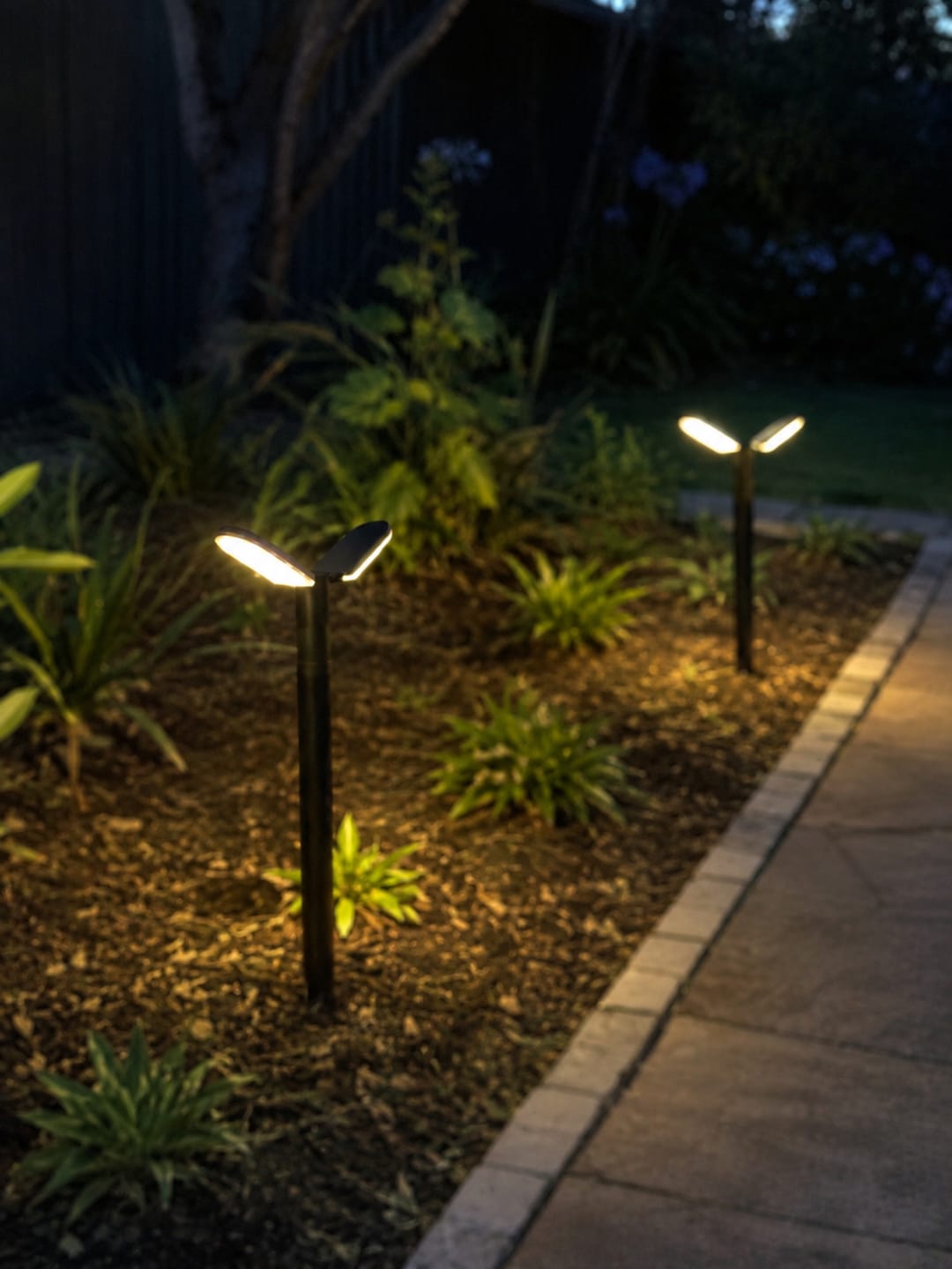 Customer photo review of Solar Garden Stake Lights IP65 Waterproof Auto Dusk to Dawn Outdoor