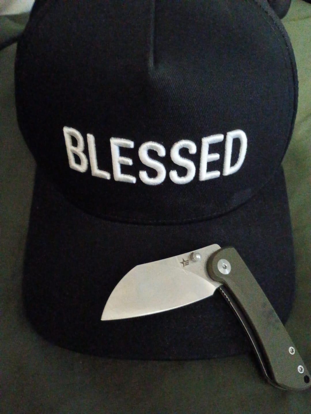 Customer photo review of Titanium Pocket Knife