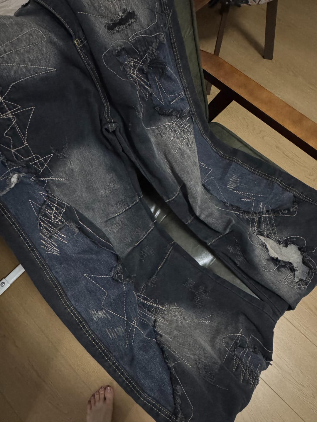 Customer photo review of Patched Washed Distressed Wide-Leg Jeans