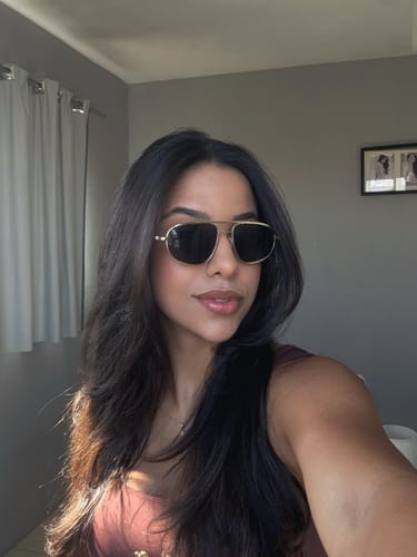 Customer's Icon Sunglasses with aviator frame worn by a person, showing a comfortable fit.