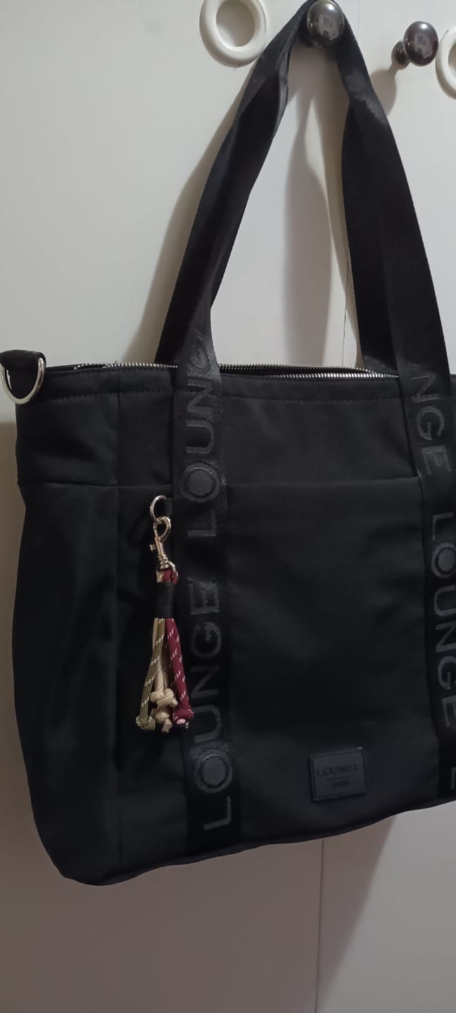 Customer photo review of Bolso Nylon Llavero Street