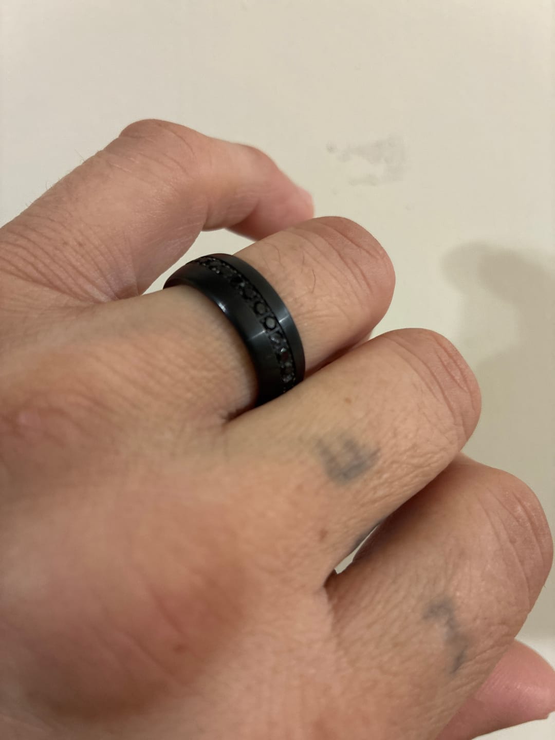Customer photo review of 8mm Black Tungsten Wedding Band with Black Sapphires
