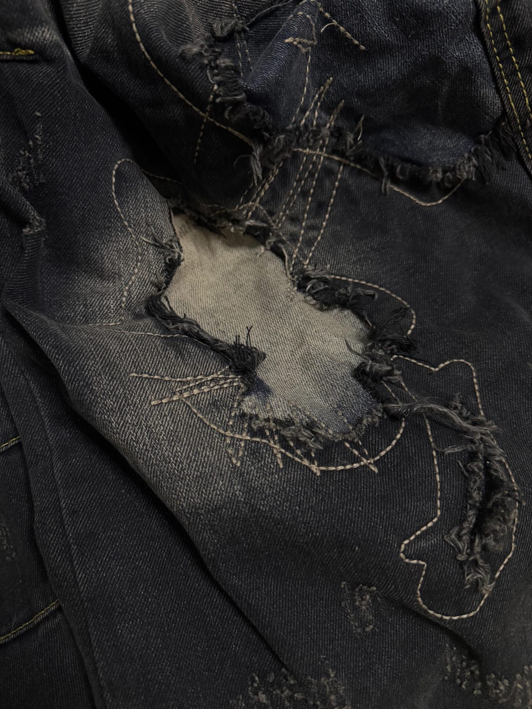 Customer photo review of Patched Washed Distressed Wide-Leg Jeans