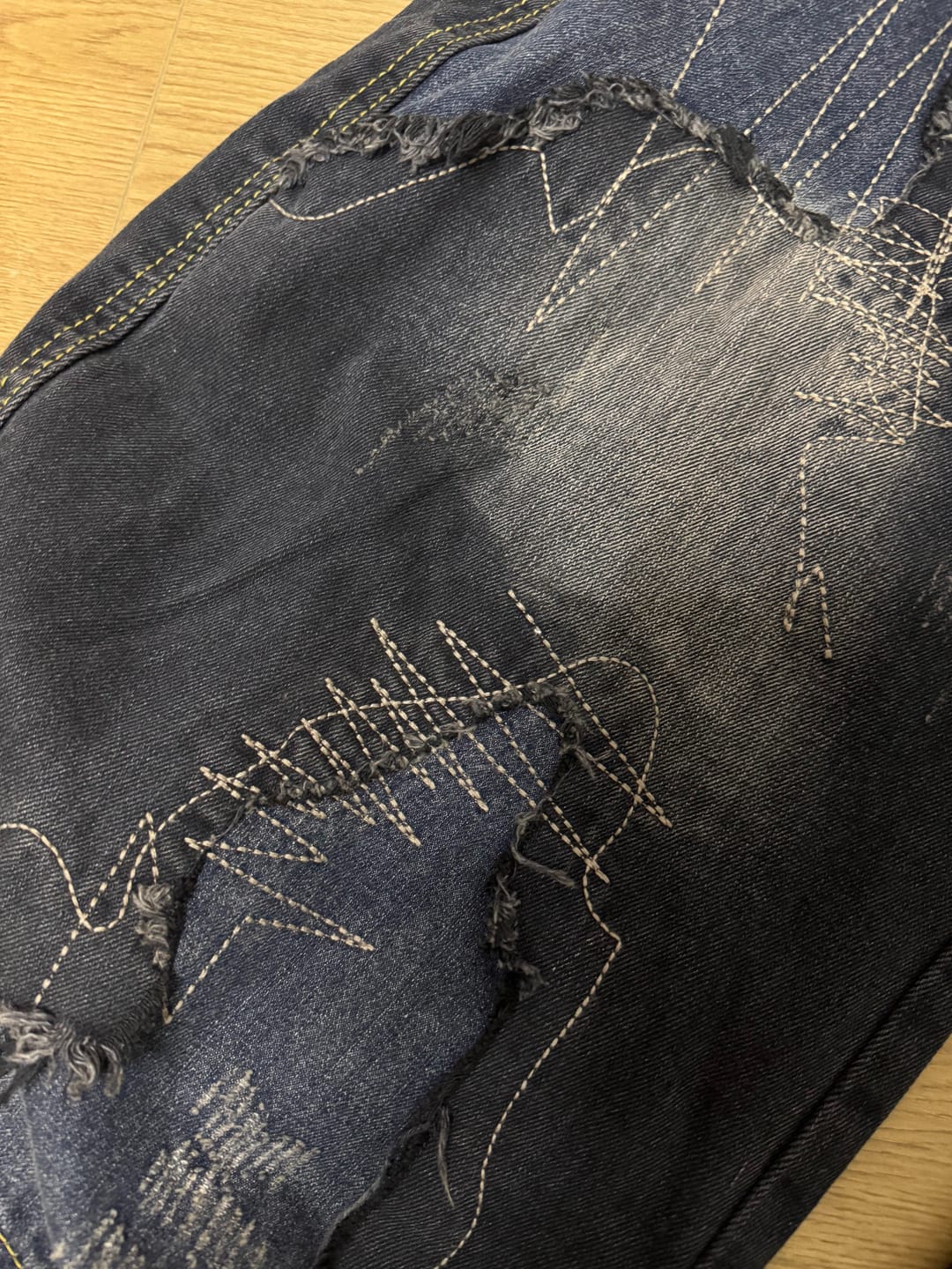 Customer photo review of Patched Washed Distressed Wide-Leg Jeans