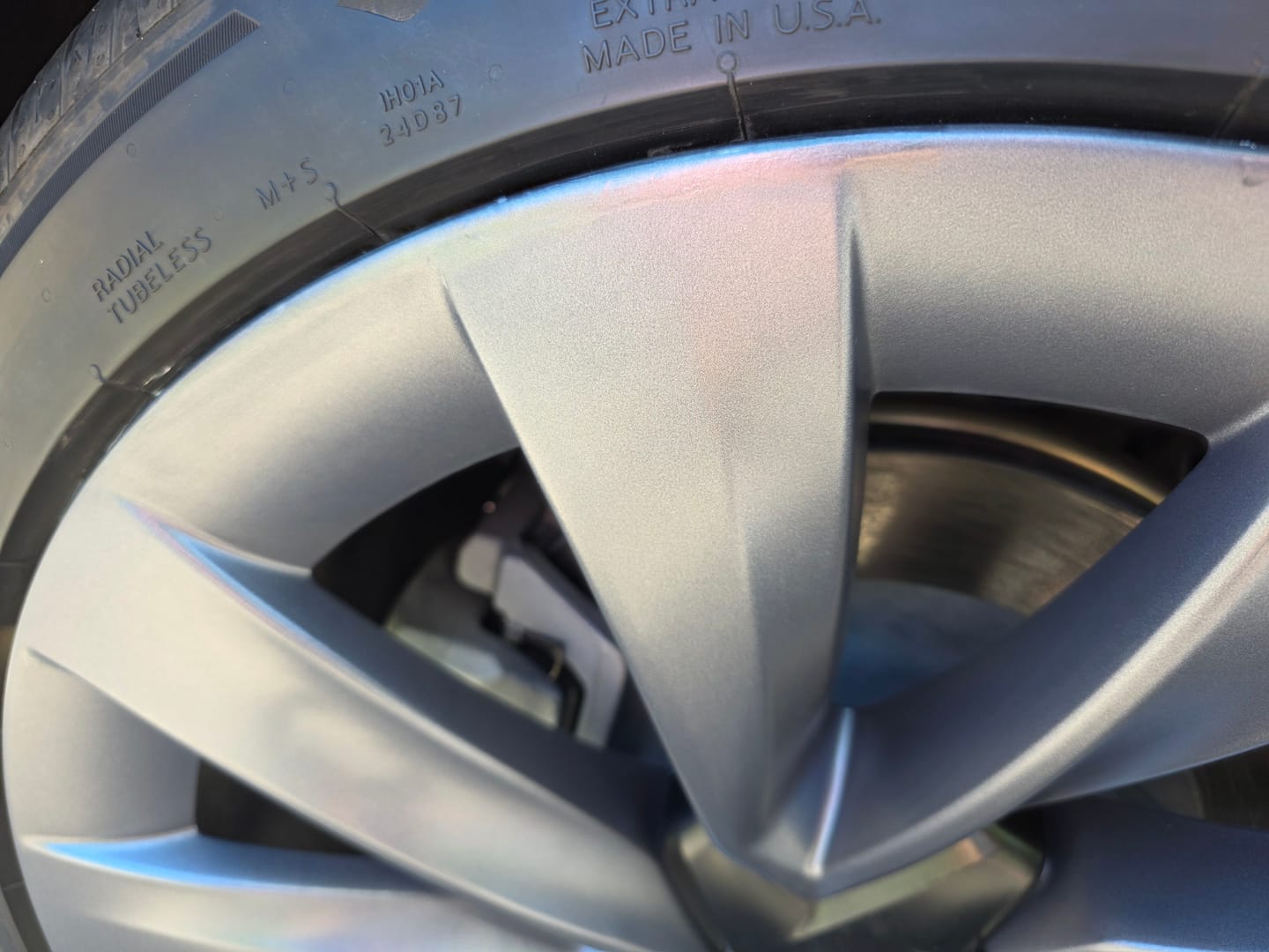 Customer photo review of Tesla Wheel Curb Rash Repair Kit for Model Y 20-inch Gunmetal Grey Helix 2.0 Rims with Color-matched Touch-Up Paint