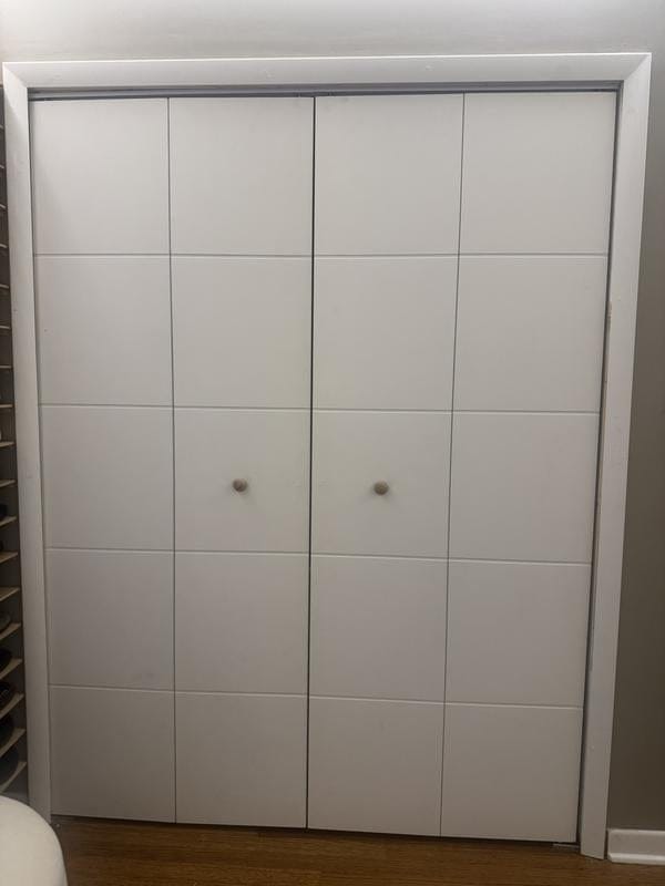 Customer photo review of TENONER White Primed 5-Panel Hollow Core Bifold Door with Hardware Kits