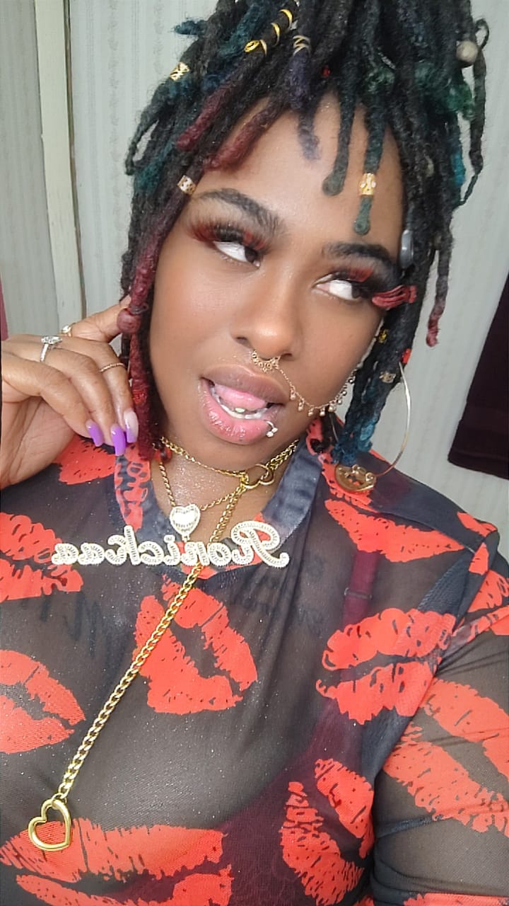 Customer photo review of LUXIIVA® CURSIVE FONT ICED OUT-BAGUETTE CUSTOM NAME PENDANT