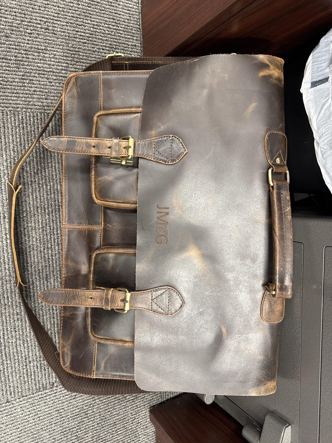 Customer photo review of Retro Brown Leather Messenger Bag for Men and Women