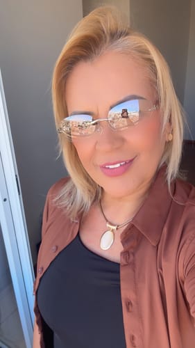 Customer's Taylor sunglasses with minimalist design being worn by a person.