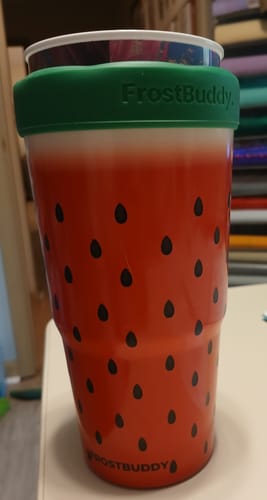 Reviewer's watermelon patterned To-Go Buddy cup with a green FrostBuddy rim