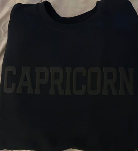 Customer photo review of Black Zodiac Puff Print Crewneck
