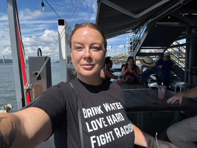 Customer photo review of Drink Water Fight Racism Unisex T-shirt