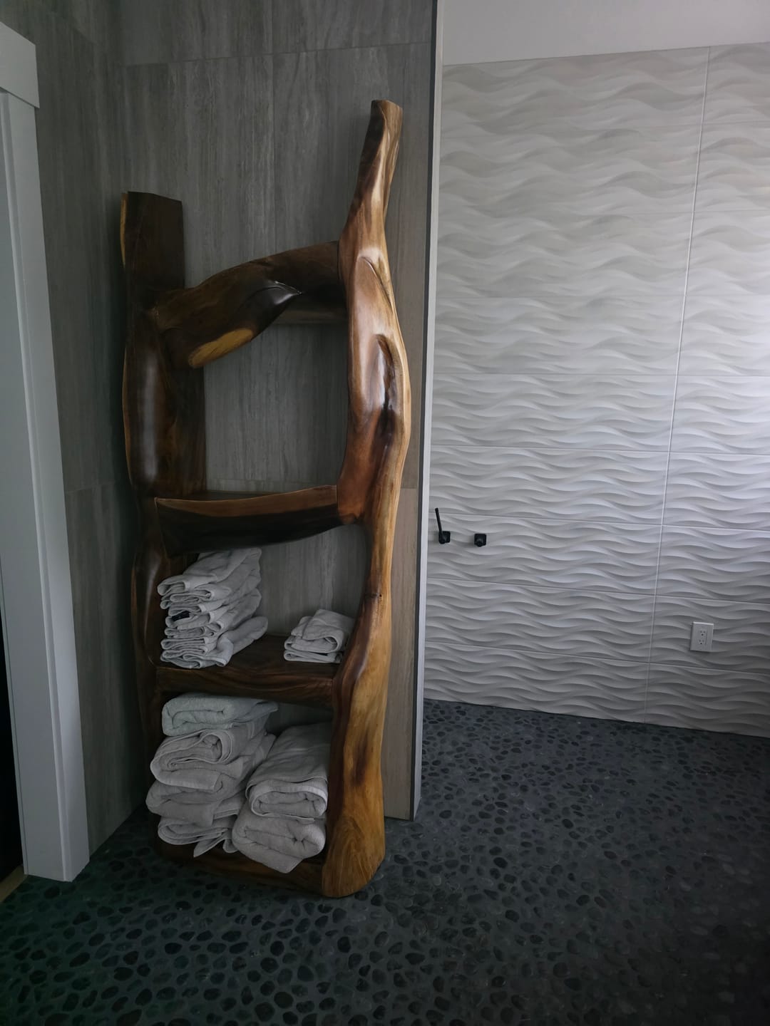 Customer photo review of Handcrafted Sculptural Bathroom Shelf For Towels Or Spa Storage