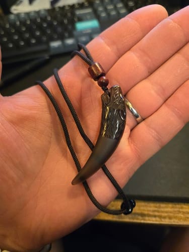 Customer photo review of Ice Obsidian Wolf Fang Pendant Necklace