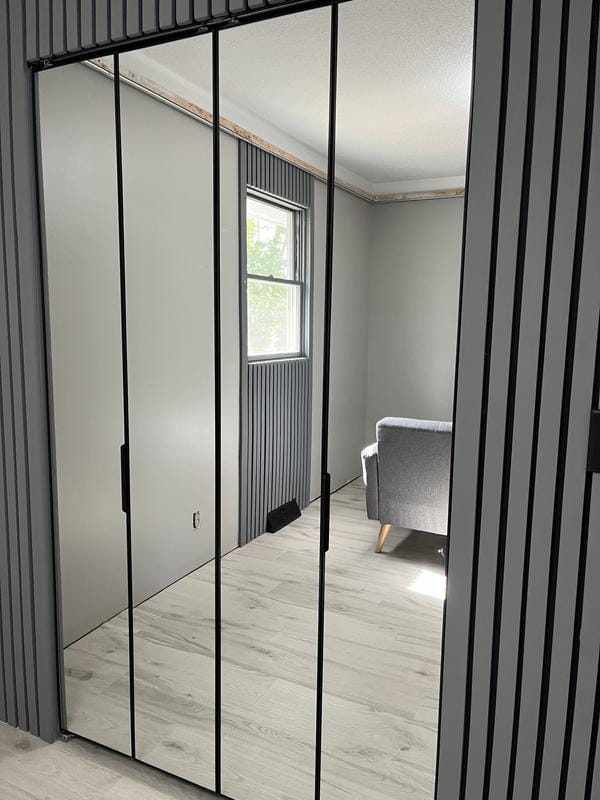 Customer photo review of TENONER Black Aluminum Frame Mirrored Interior Bi-Fold Closet Door for Bedroom, Laundry Room - Perfect for Dressing Design