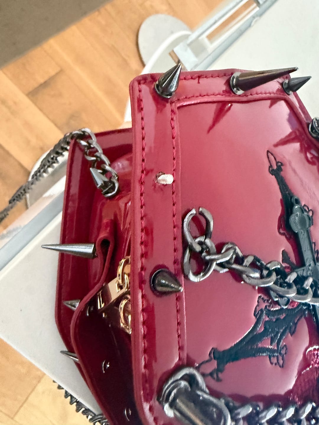 Customer photo review of Rivet cross pattern metal chain bag