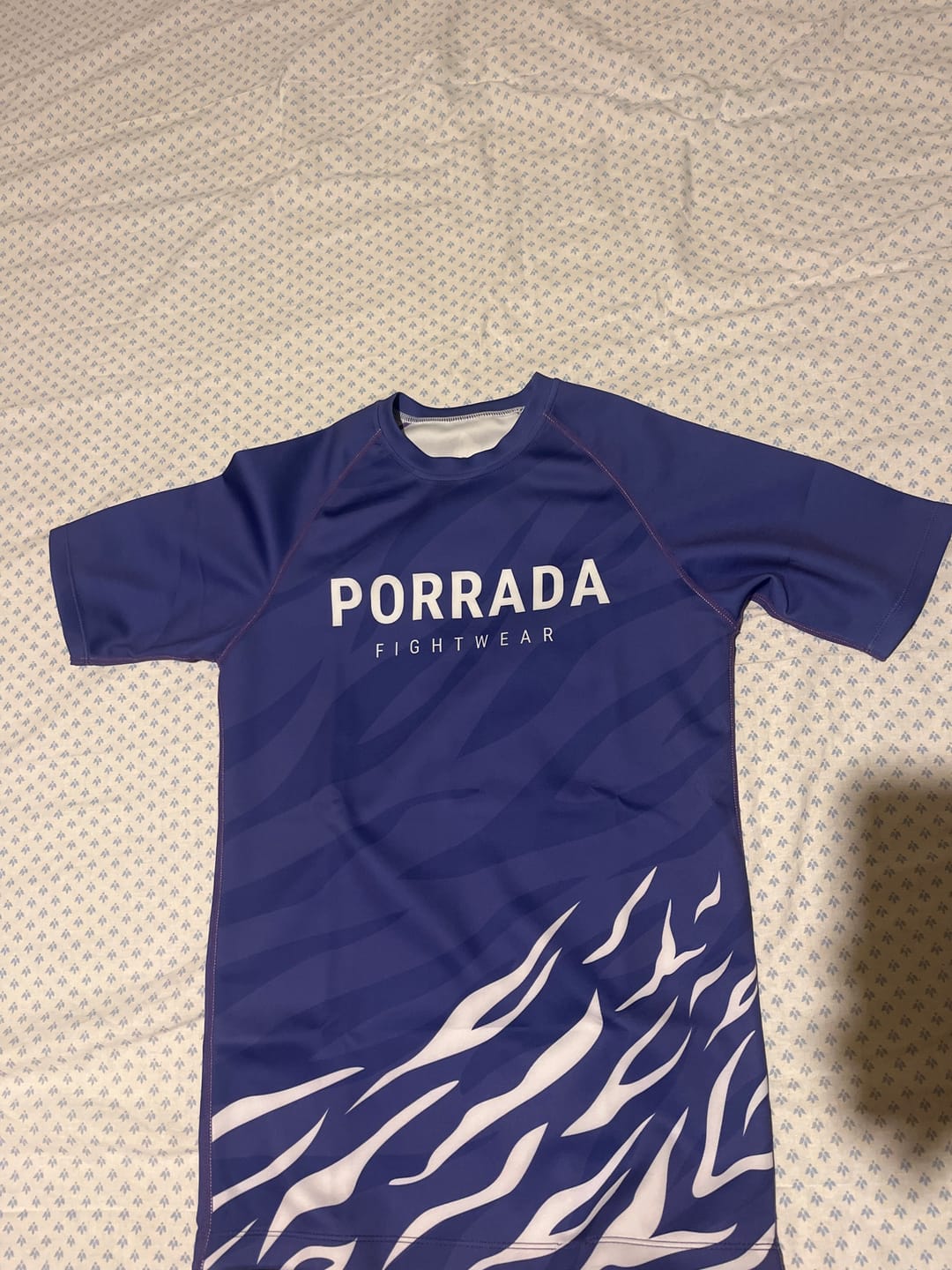Customer photo review of PURPLE BELT COMPETITION RANKED SHORT SLEEVE RASH GUARD