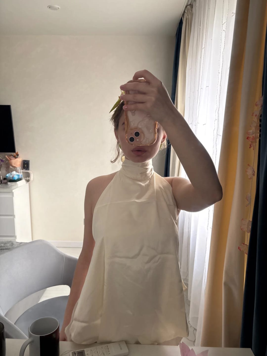Customer photo review of Elina Halter Pleated Sleeveless Top