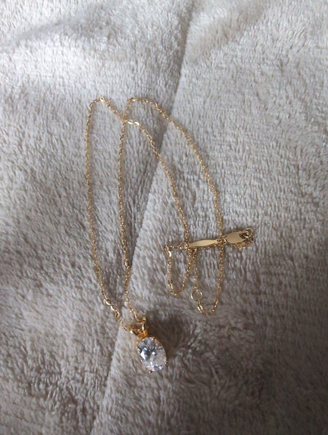 Customer photo review of Solitaire Oval Moissanite Sterling Silver Necklace Pendant